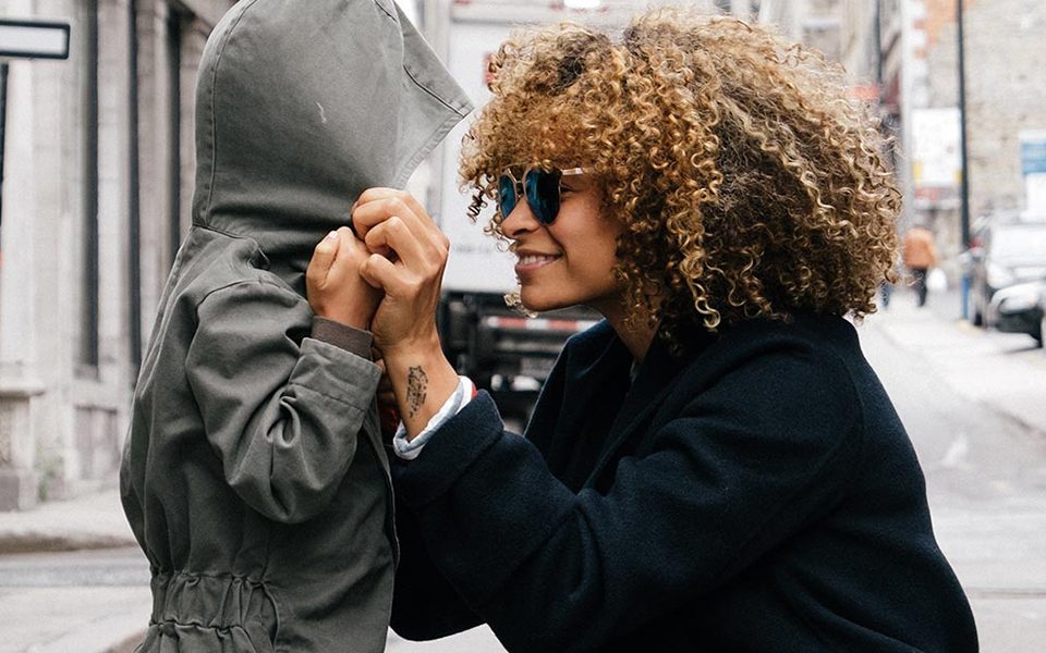 A woman wearing shades on the street