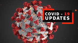 Graphical representation of the covid-19 virus with an updates banner.