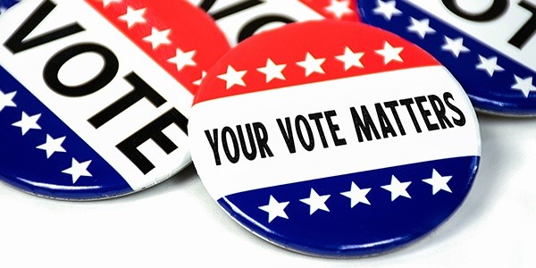 American-themed "your vote matters" campaign buttons.